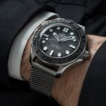 Omega Seamaster Bond replica watch with mesh bracelet on wrist